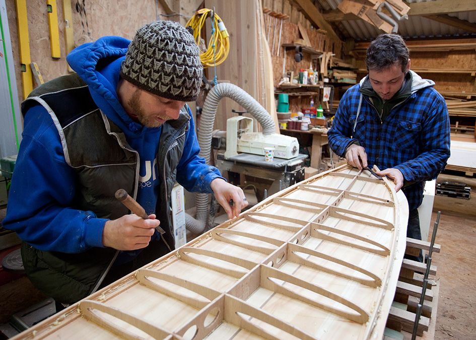 otter wooden surfboard workshop frame