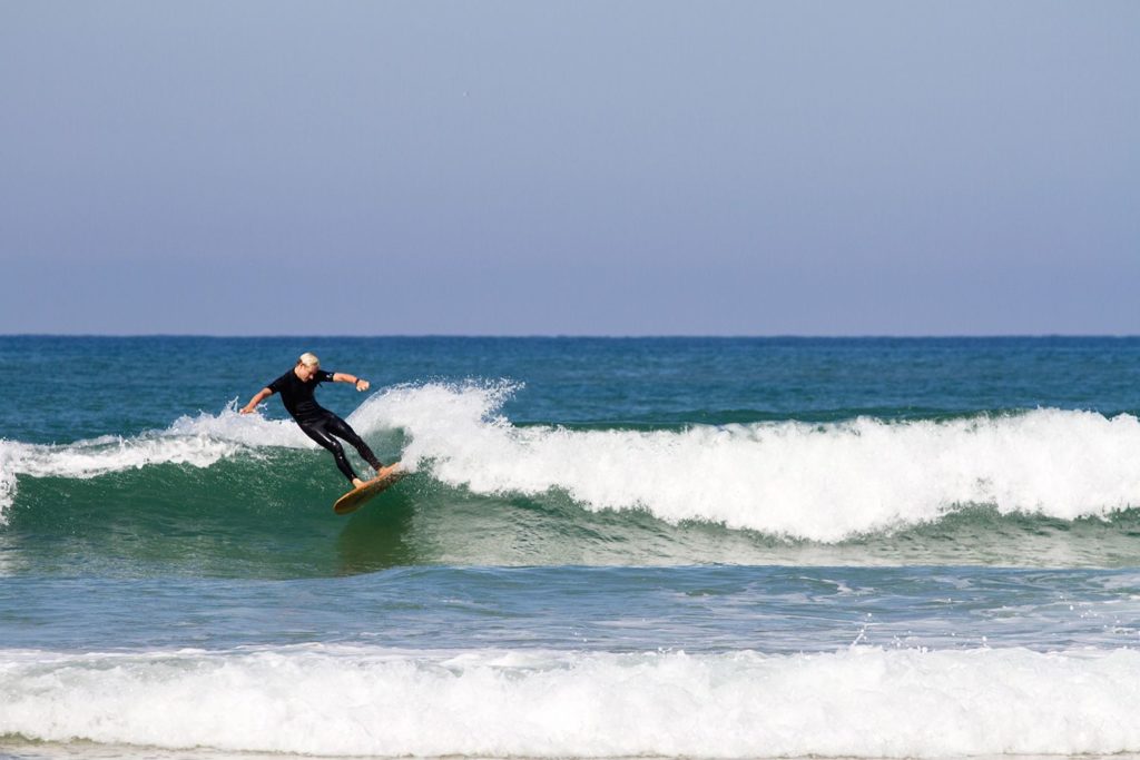 Otter wooden surfboard wave surfer