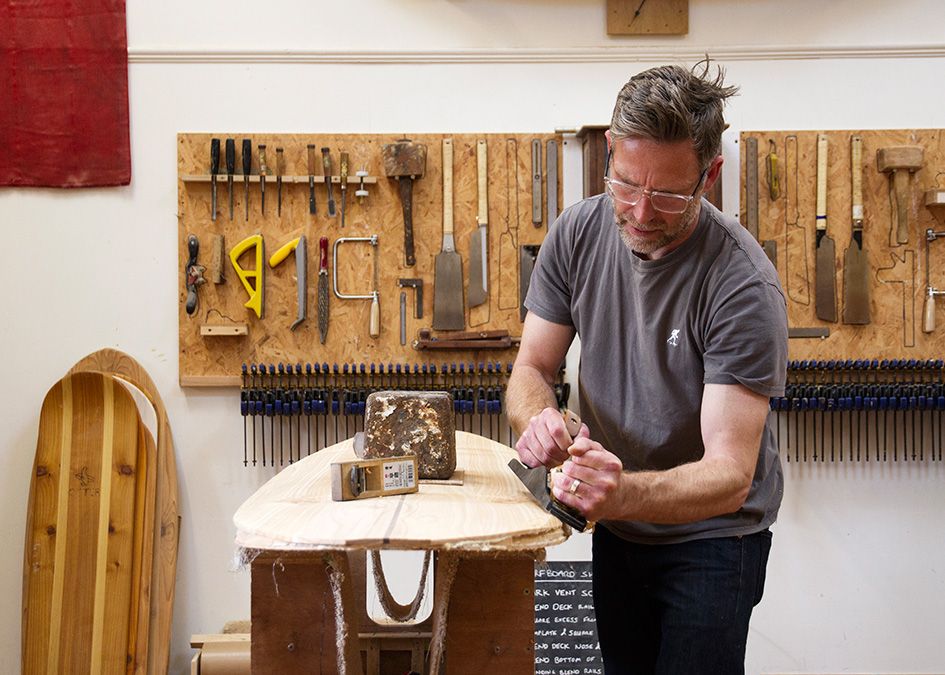 otter wooden surfboard workshop shaping