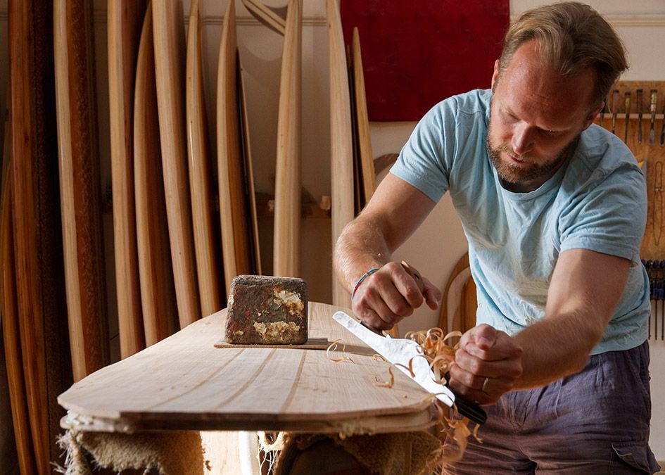 otter wooden surfboard workshop shaping
