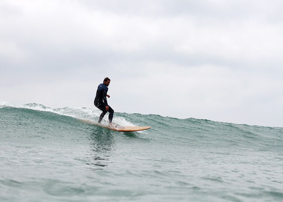 Otter wooden surfboard wave surfer