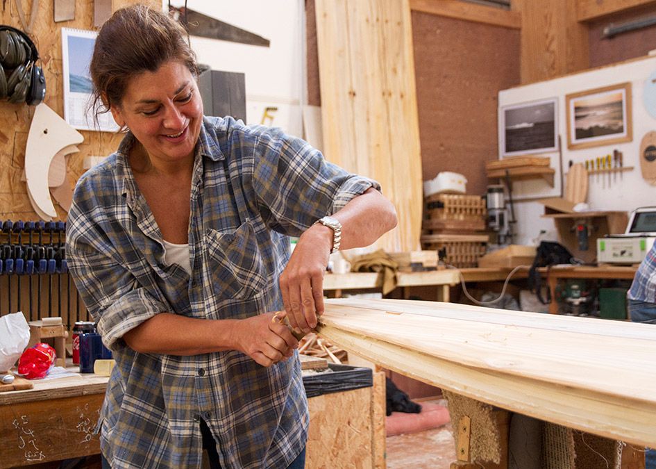 otter wooden surfboard workshop shaping