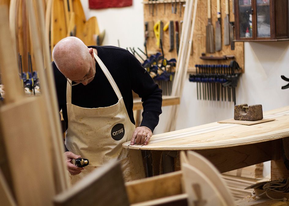 otter wooden surfboard workshop shaping nose