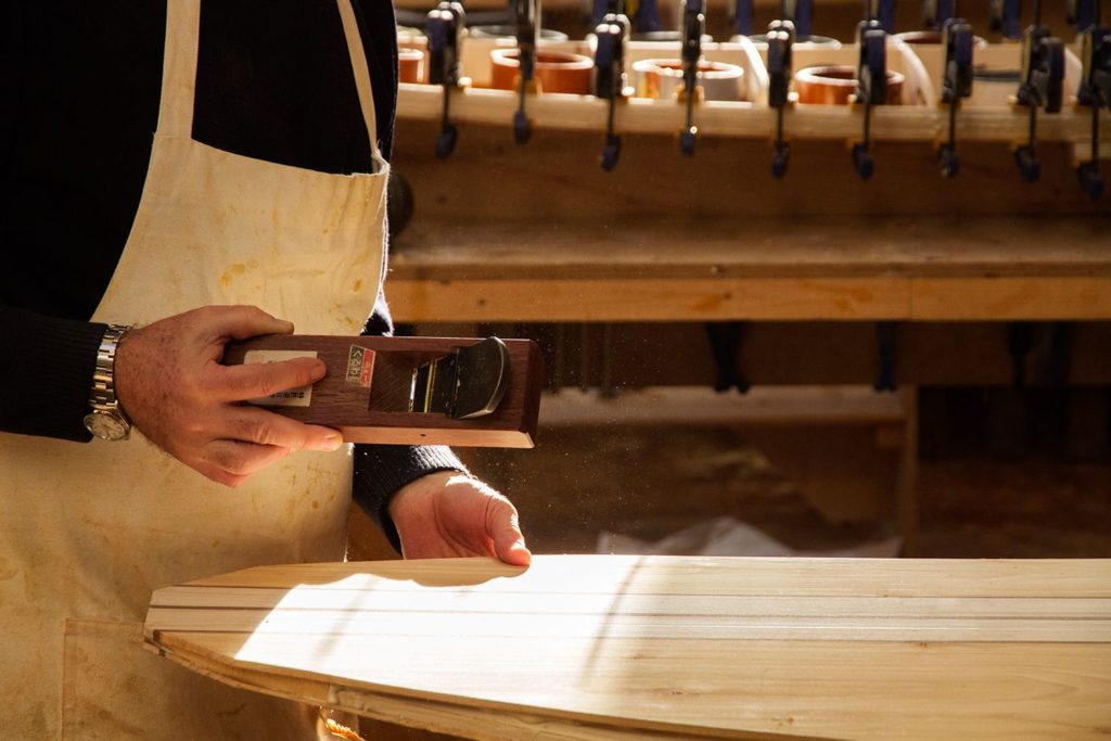 shaping wooden surfboard workshop