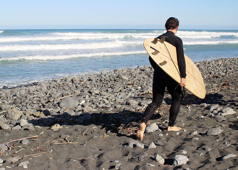 new zealand otter wooden surfboard