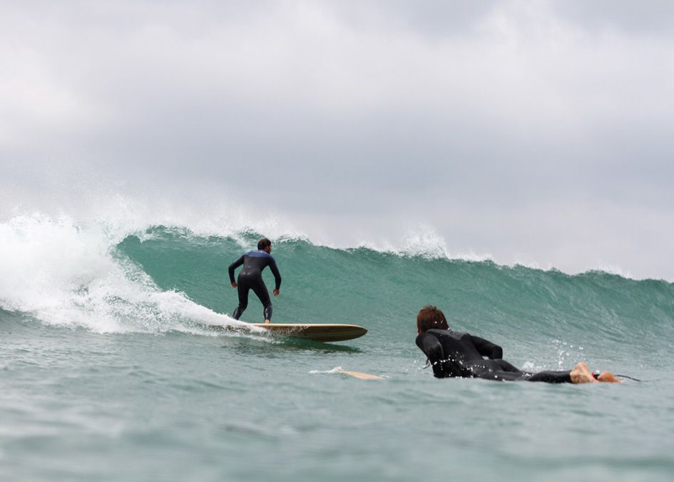 Otter wooden surfboard wave surfer