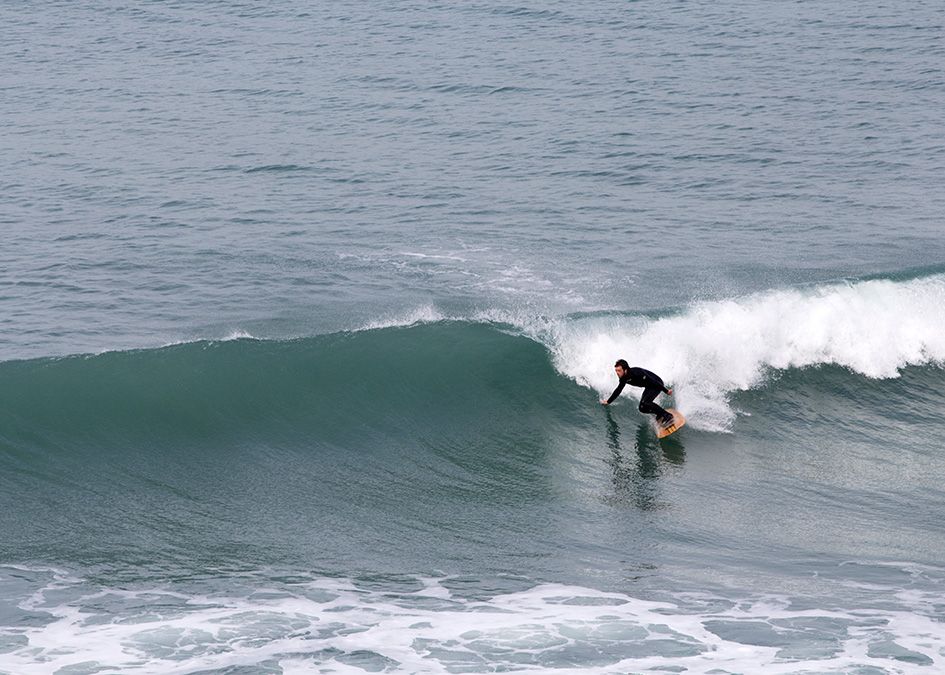 Otter wooden surfboard wave surfer