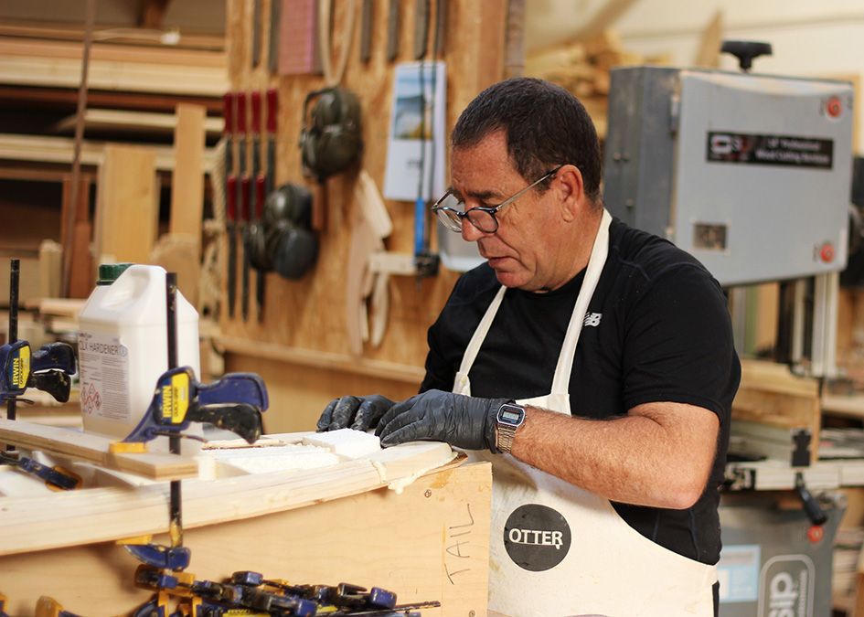 otter wooden surfboard workshop shaping