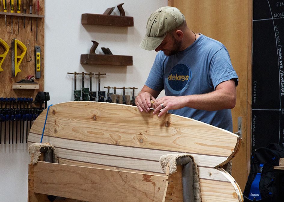 otter wooden surfboard workshop shaping