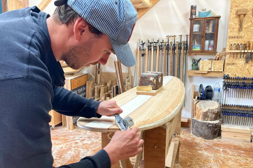 otter wooden surfboard workshop shaping