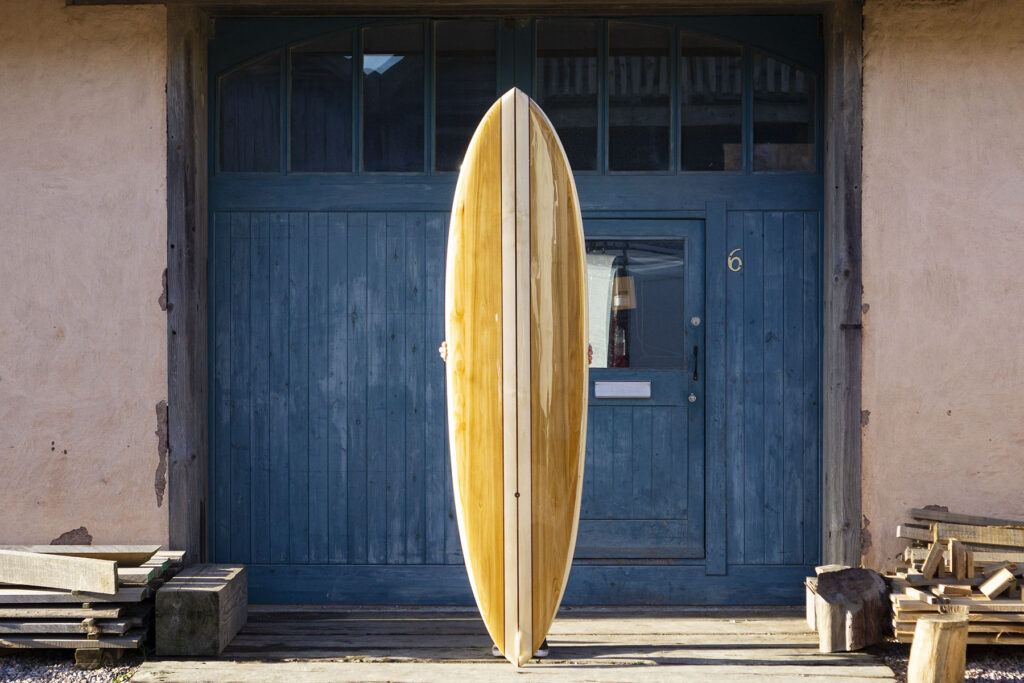 otter wooden surfboard blue doors finished