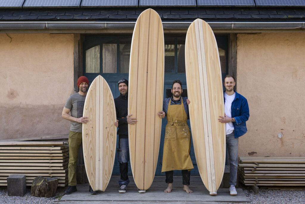 blue doors otter surfboard wooden surfboards workshop