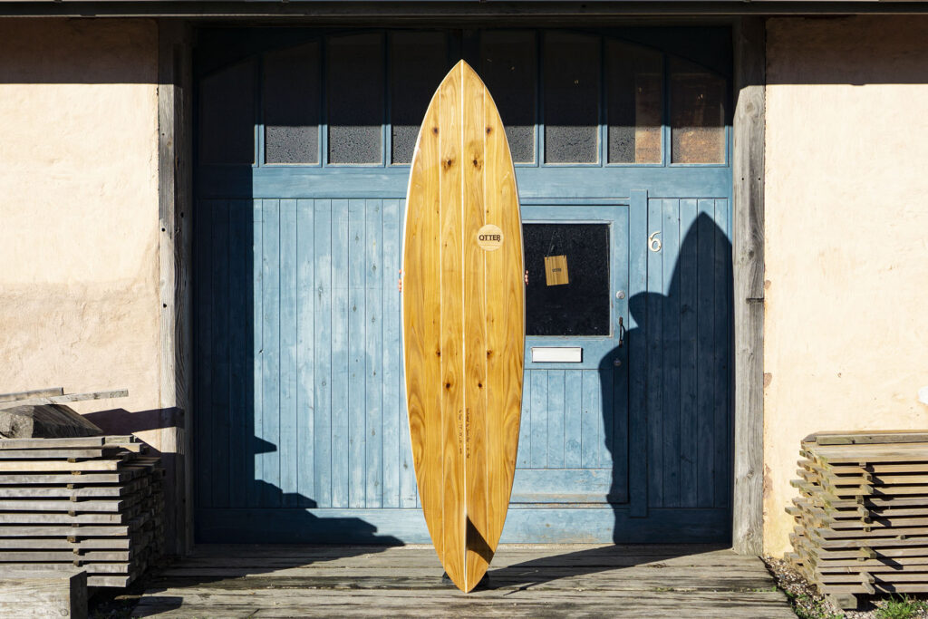 otter wooden surfboard blue doors custom handcrafted sustainable