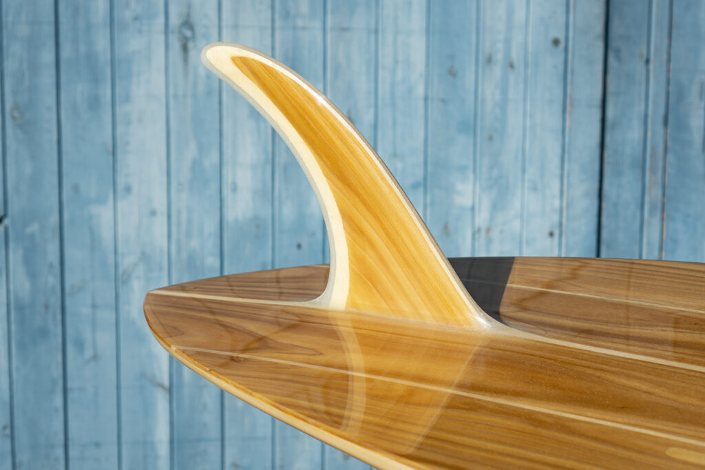 otter wooden surfboard blue doors custom handcrafted sustainable fin