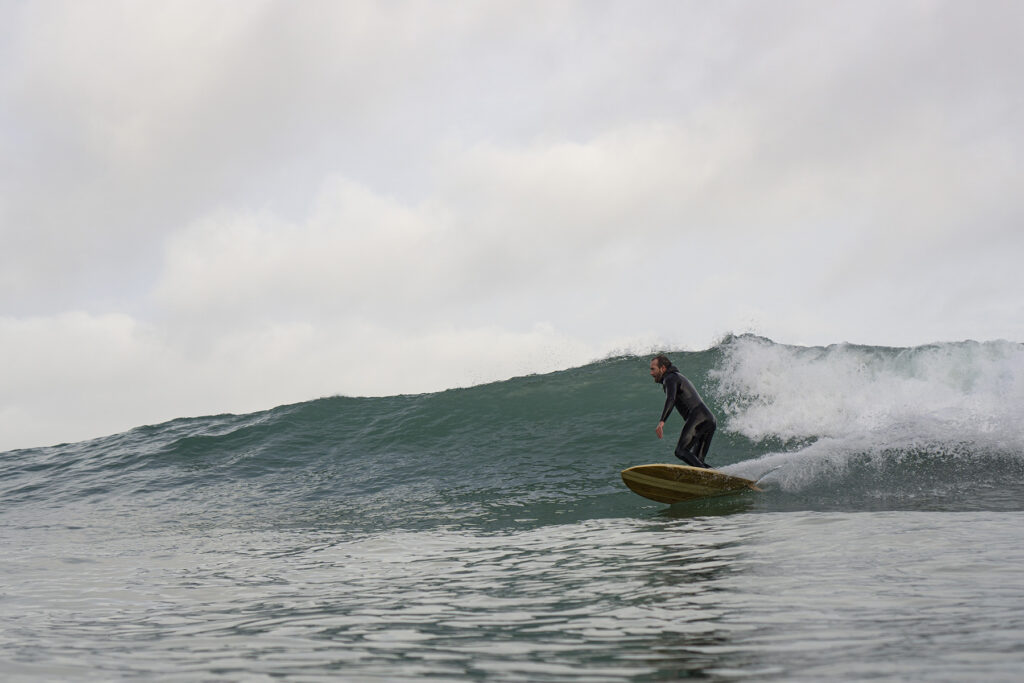 otter wooden surfboards surfer wave