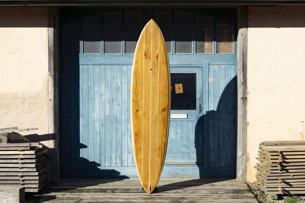 otter wooden surfboard blue doors custom handcrafted sustainable