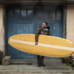 Otter Surfboards Wooden Paddleboard SUP Holding
