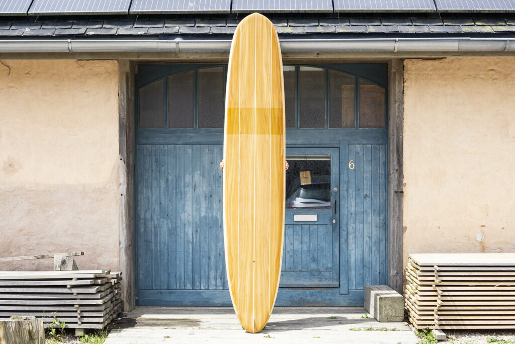 otter sustainable wooden surfboard