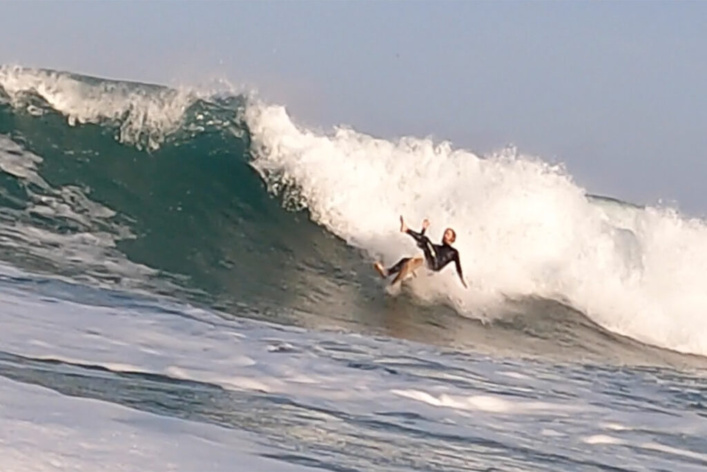 otter wooden surfboards surfer fall