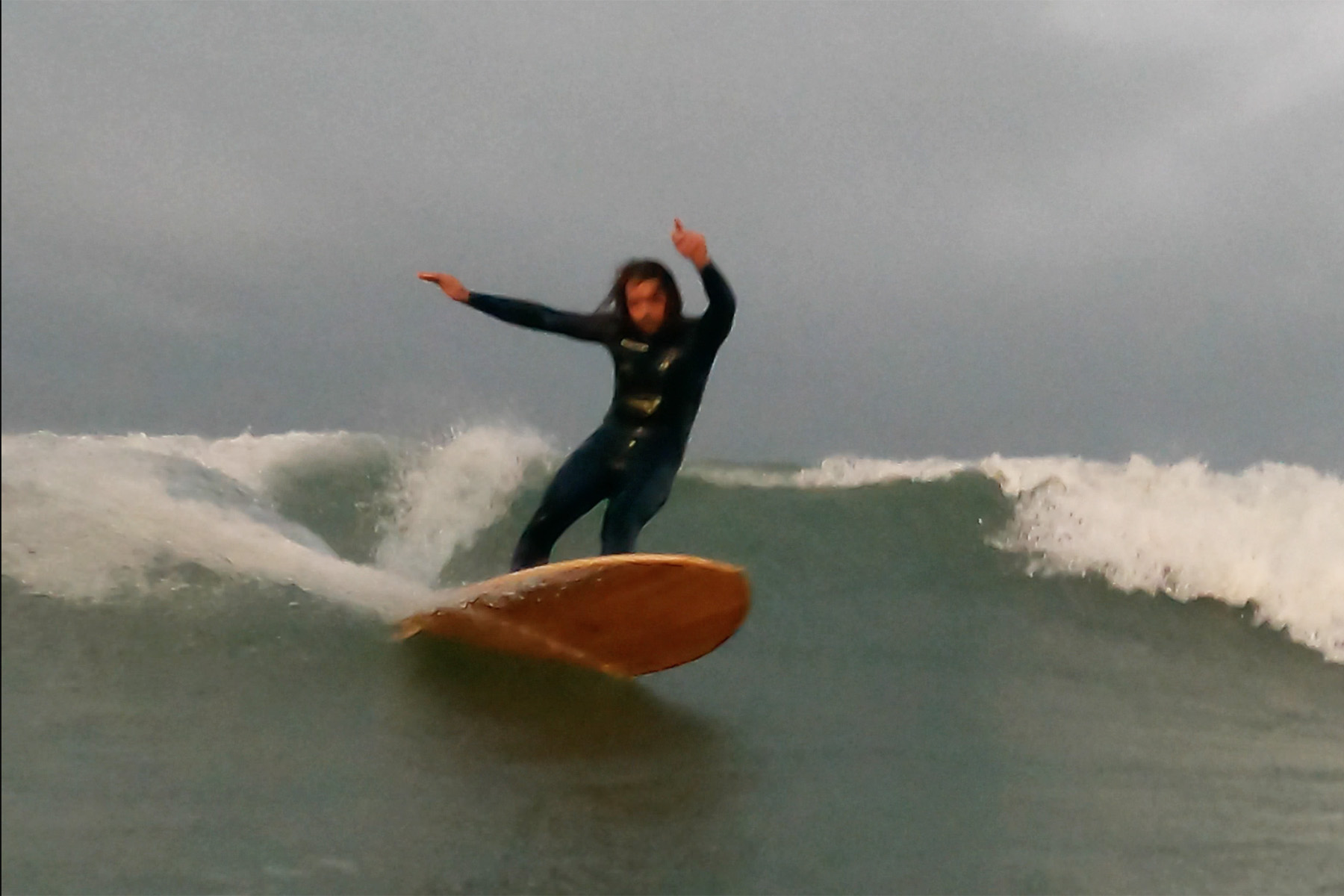 otter surfboards wooden surfboard surfer wave turn sustainable