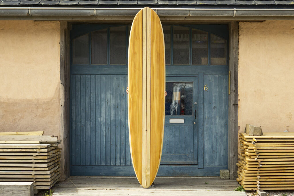 otter sustainable wooden surfboard