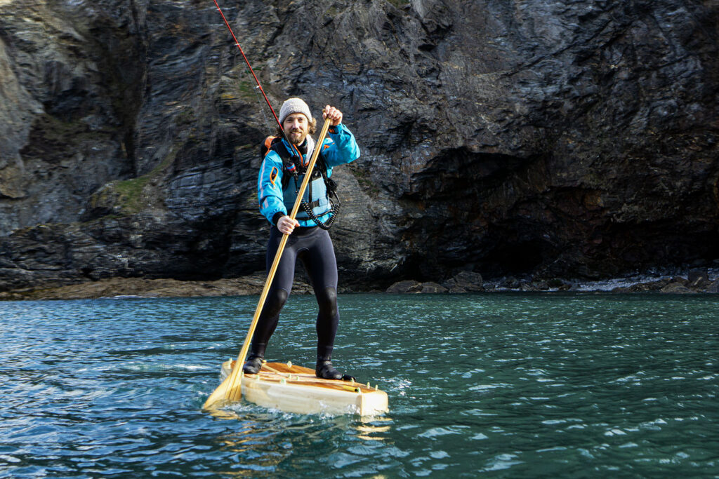 James Otter paddles one of his sustainable, wooden paddleboards.