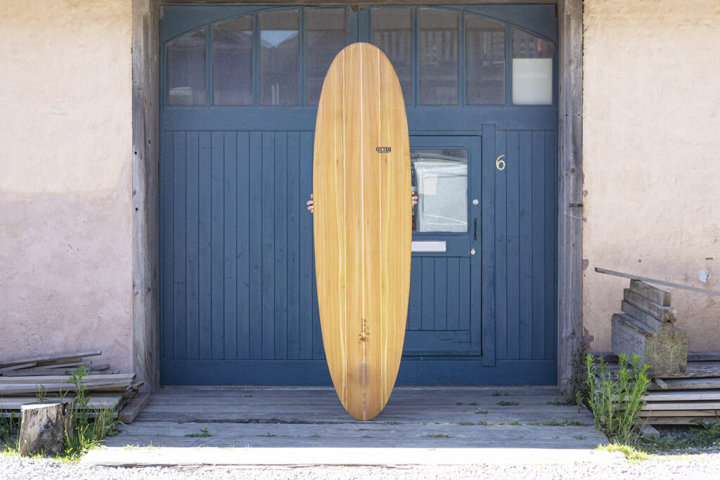 Hollow wooden surfboard by Otter Surfboards